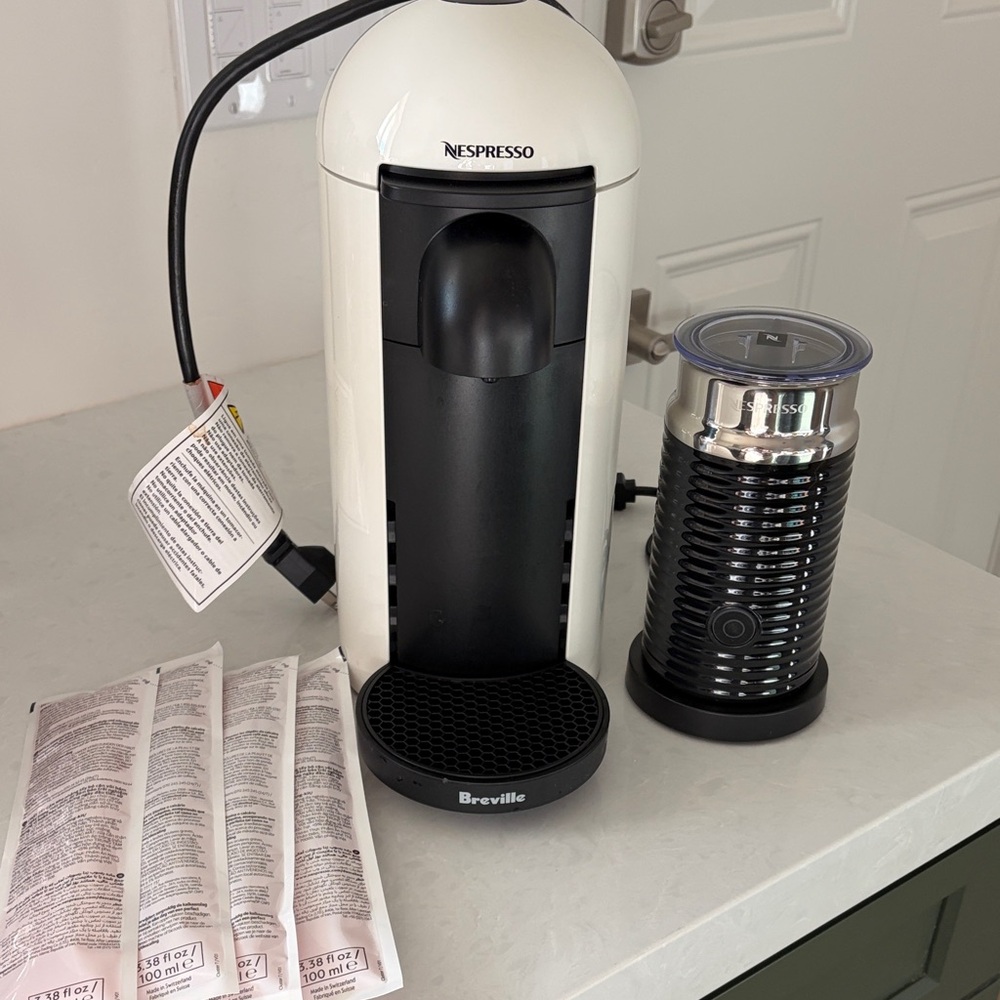 Nespresso White and Black Coffee Maker with Frother & descaling liquid